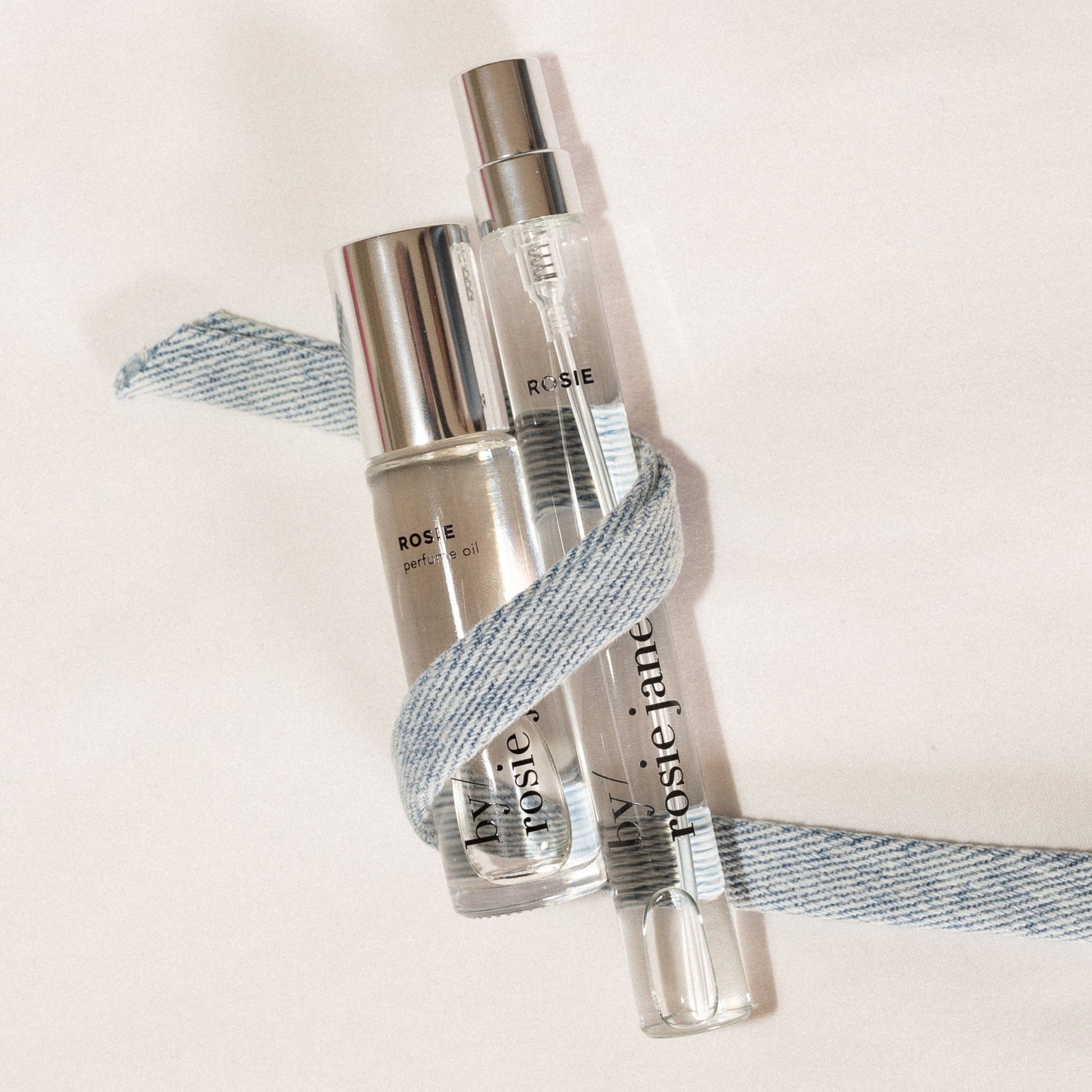 perfume oil and travel spray with a ribbon