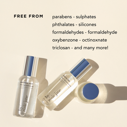 Cosmetic products with a list of ingredients they are free from on a beige background