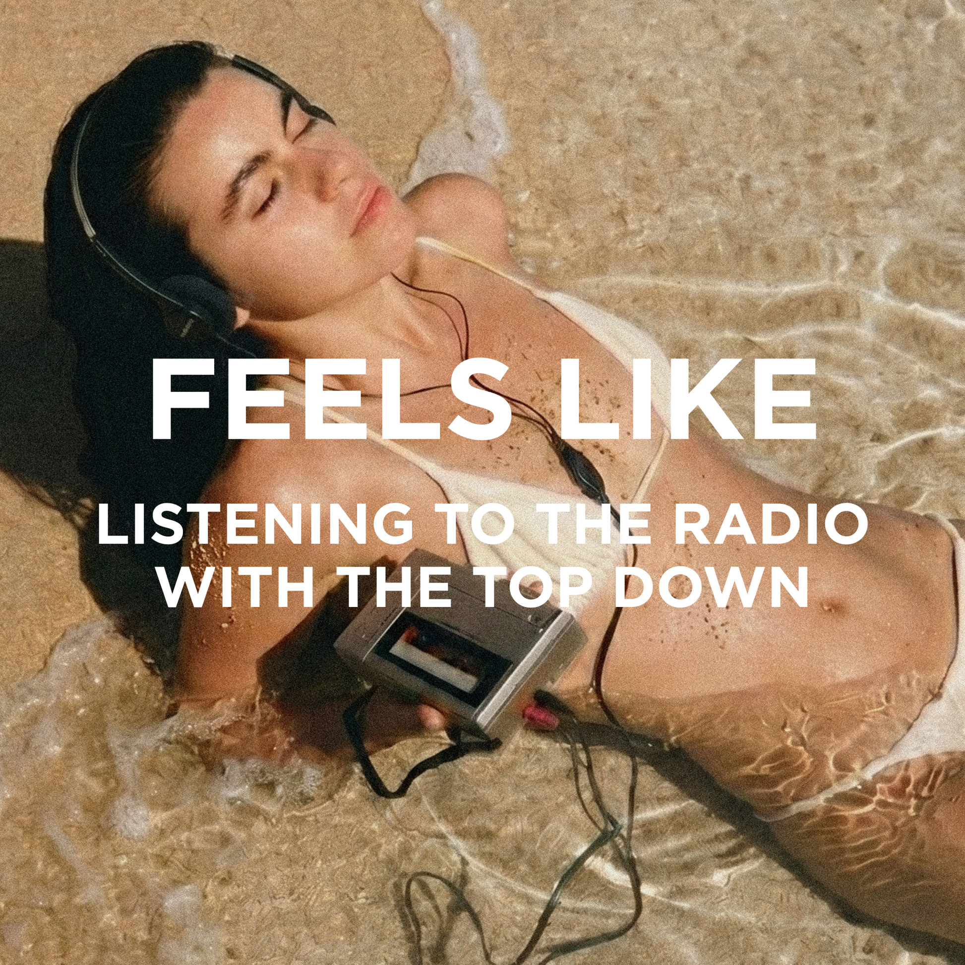 A woman lying on a sandy beach in shallow water, wearing over-ear headphones and holding a cassette tape player. Large white text across the center reads, 'FEELS LIKE LISTENING TO THE RADIO WITH THE TOP DOWN.