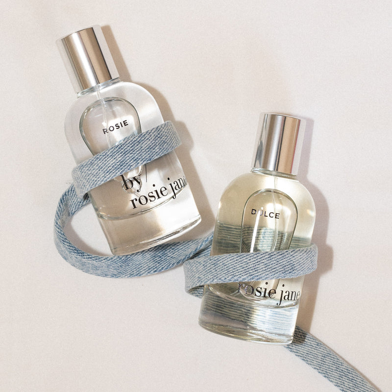 Rosie and Dulce perfume bottles by Rosie Jane on a light background
