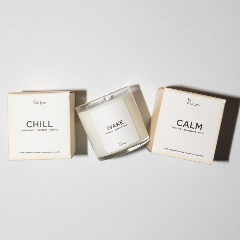 3 candles on a white background. they come in boxes.