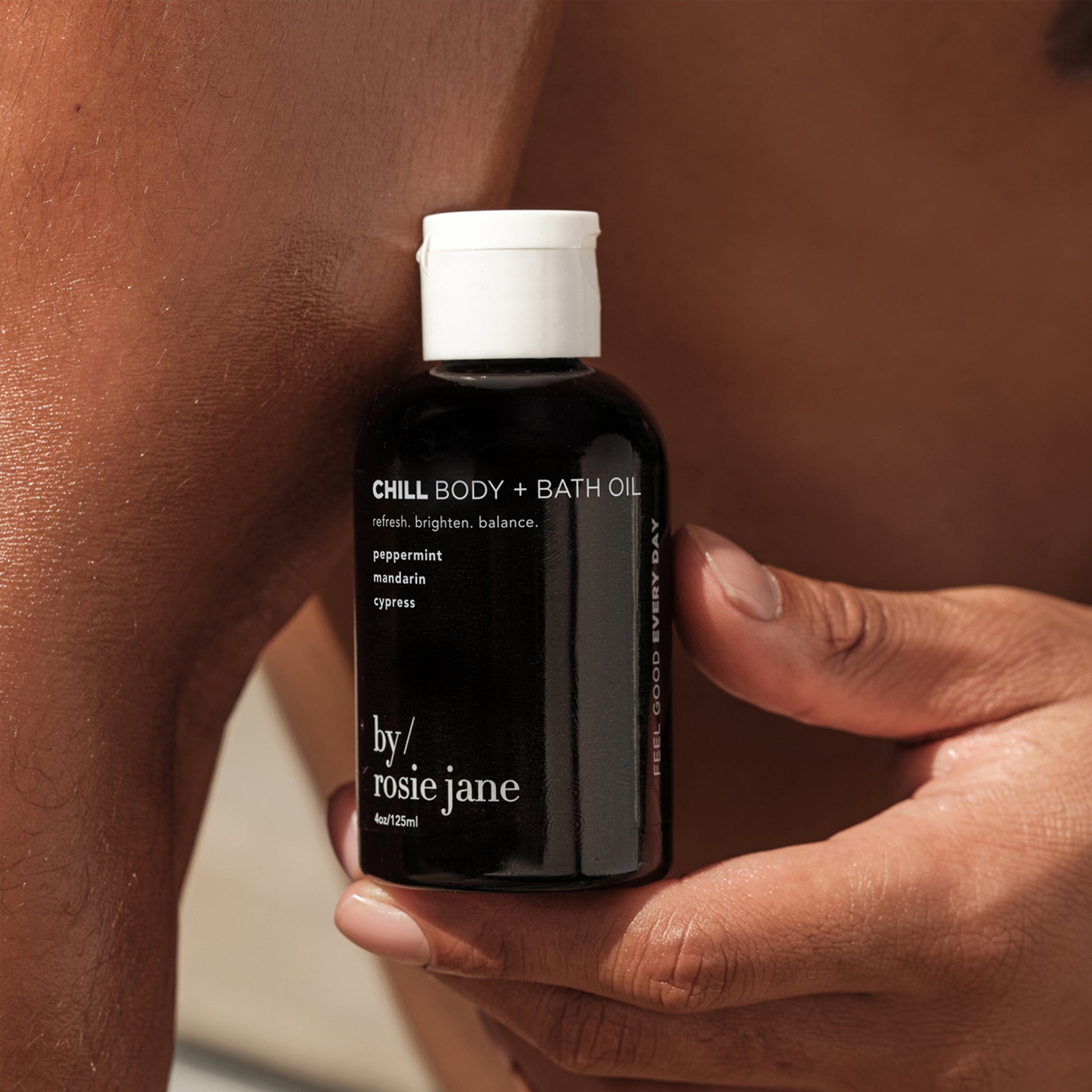 chill body oil in a hand