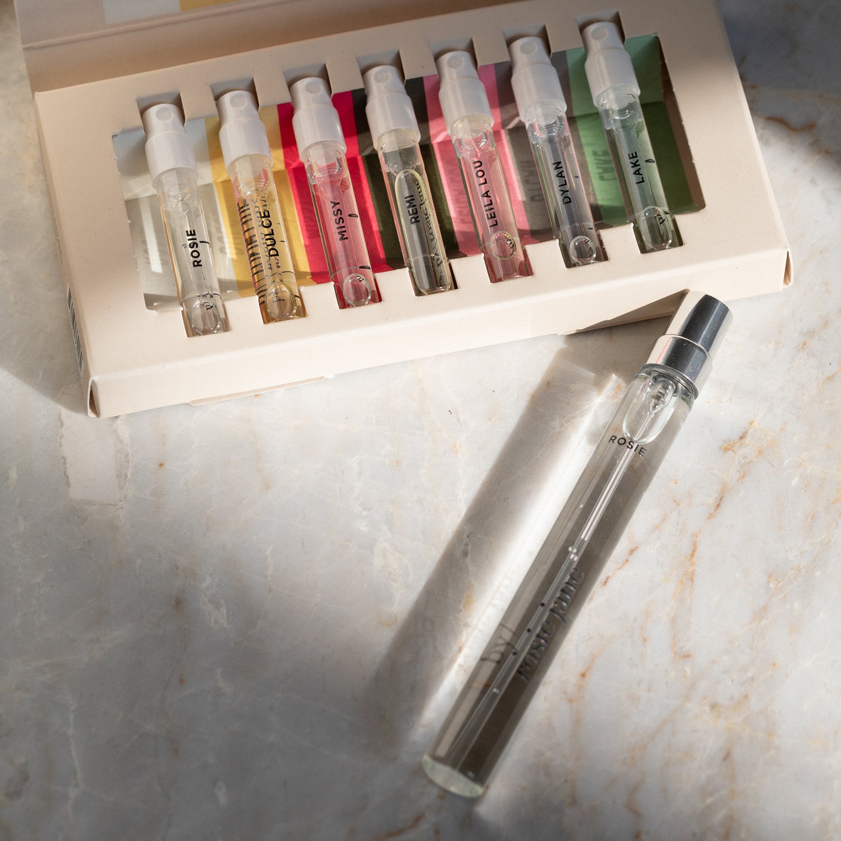 discovery set with rosie travel spray on a bathroom counter