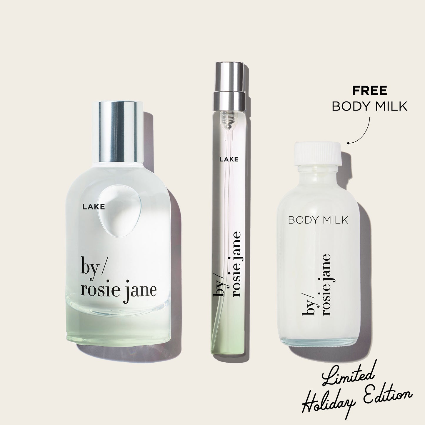 Three LAKE 'by Rosie Jane' products on a white background with 'Free Body Milk' text.