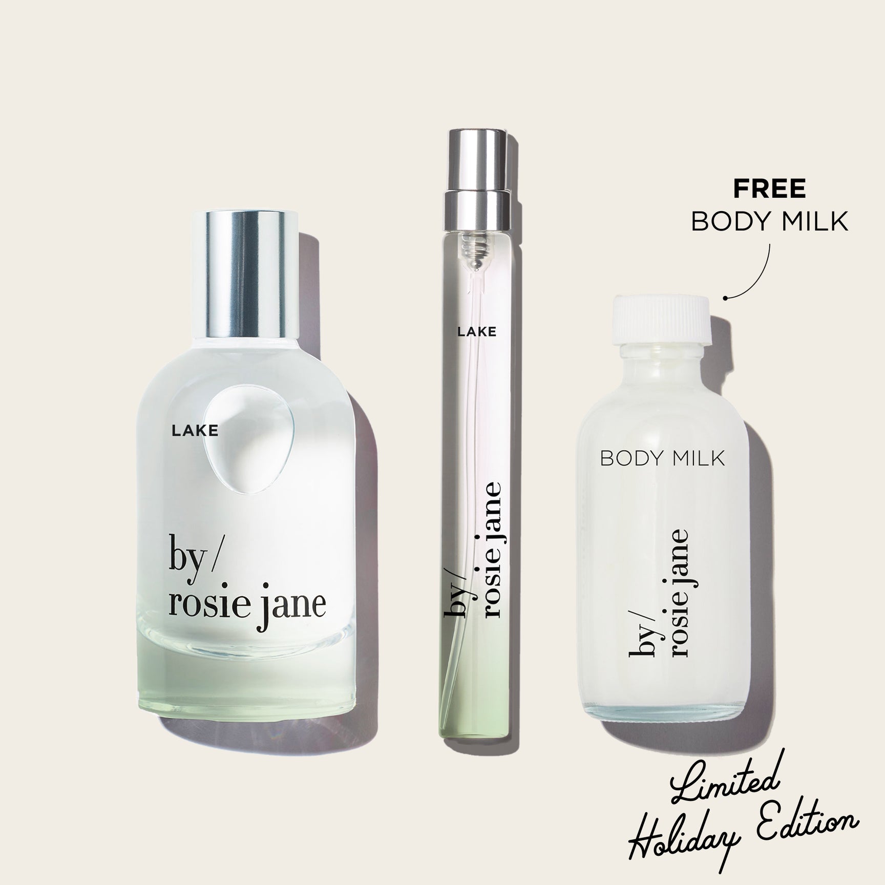 Three LAKE 'by Rosie Jane' products on a white background with 'Free Body Milk' text.