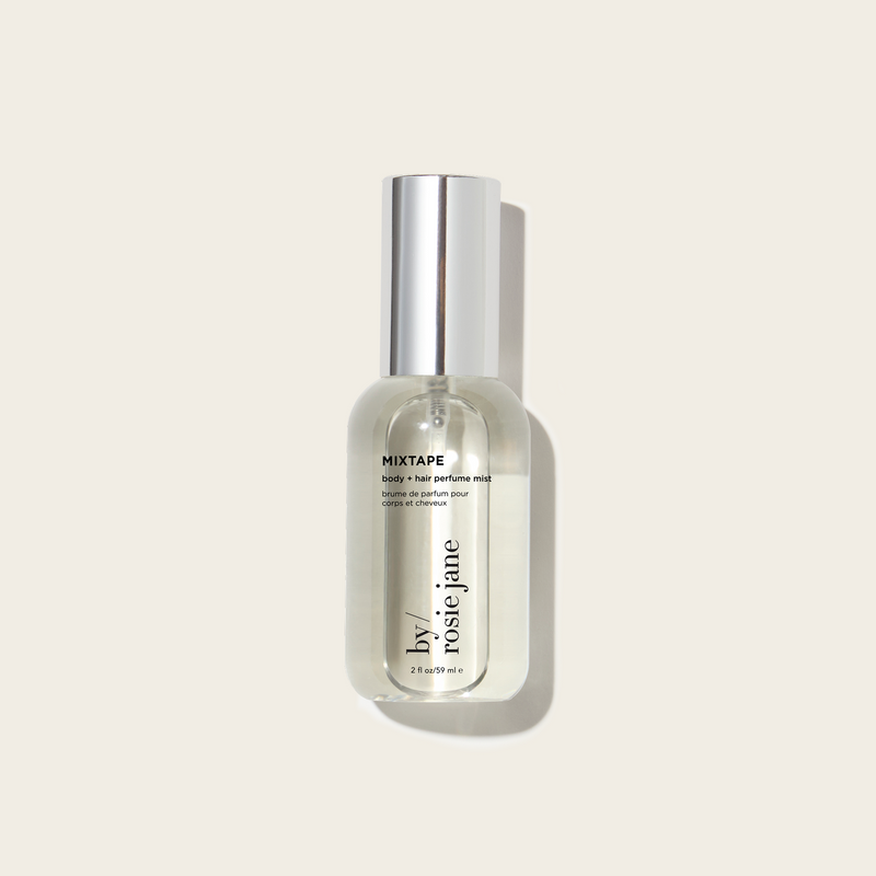 Perfume bottle labeled 'MIXTAPE' by Rosie Jane on a light beige background