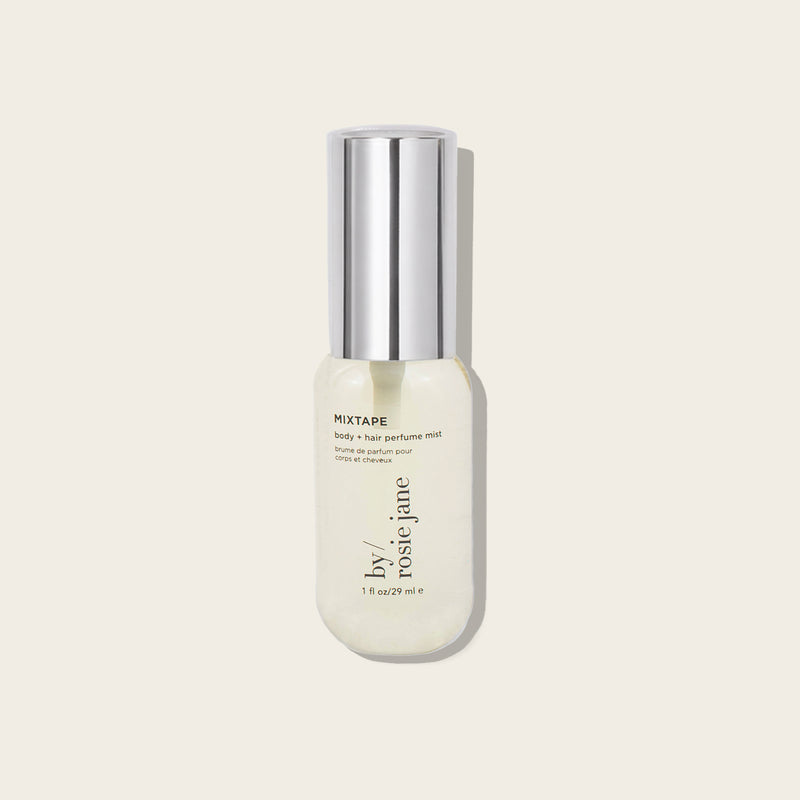 Perfume bottle labeled 'MIXTAPE' by Rosie Jane on a light beige background