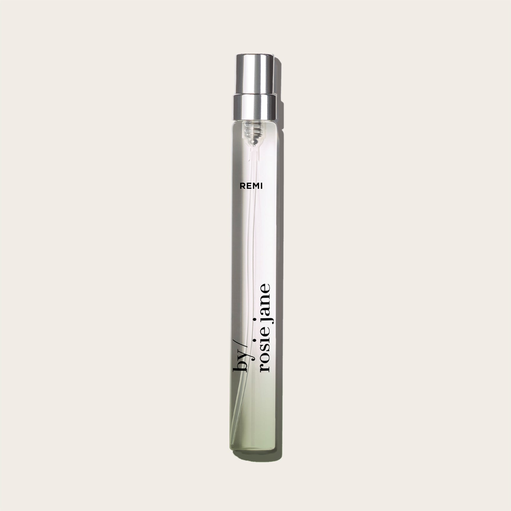 REMI travel spray on light background