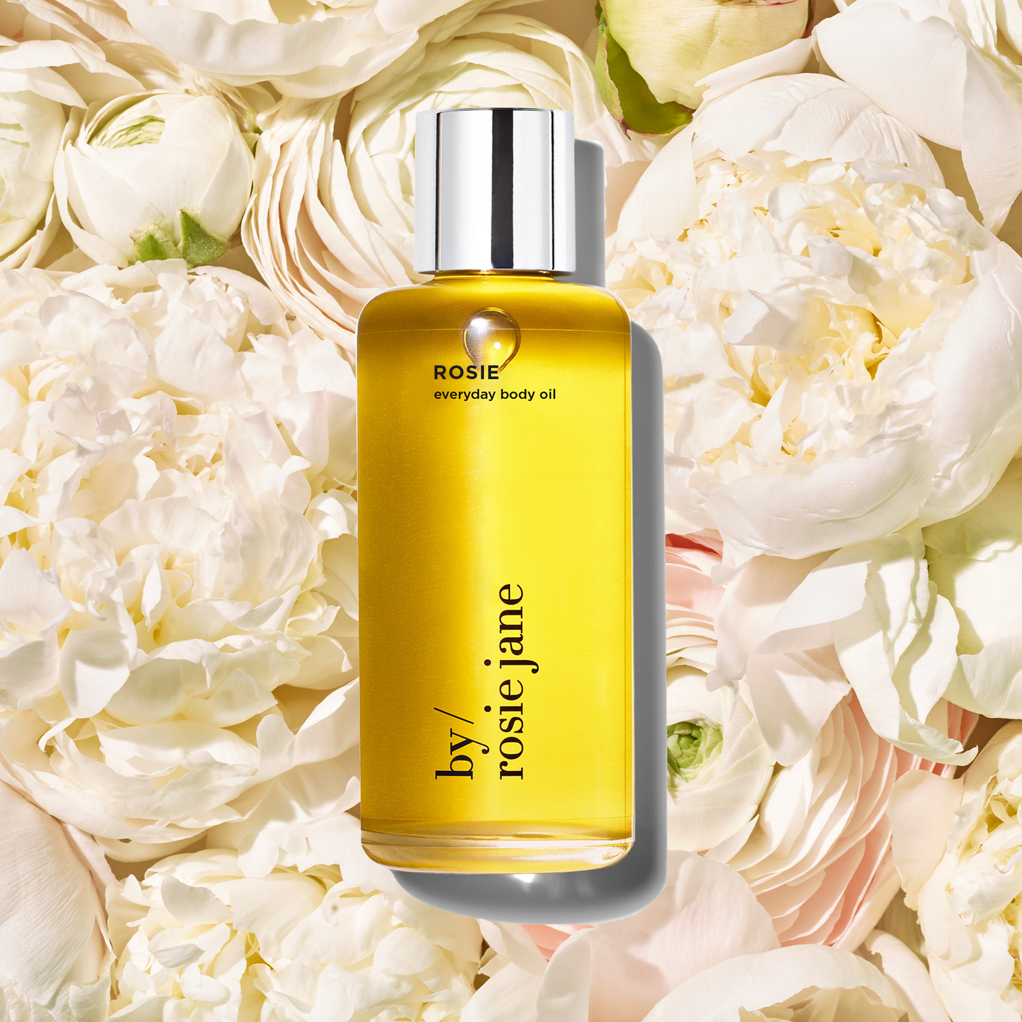 Rosie body oil on roses 