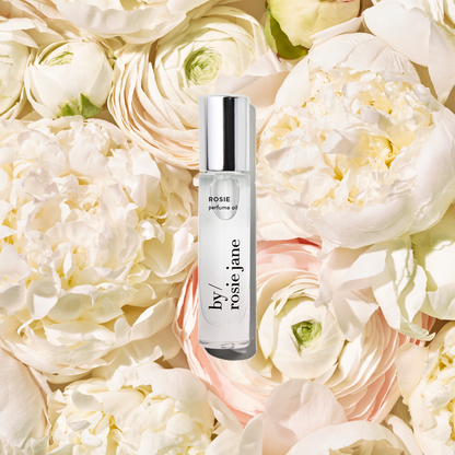 Rosie perfume oil on roses 