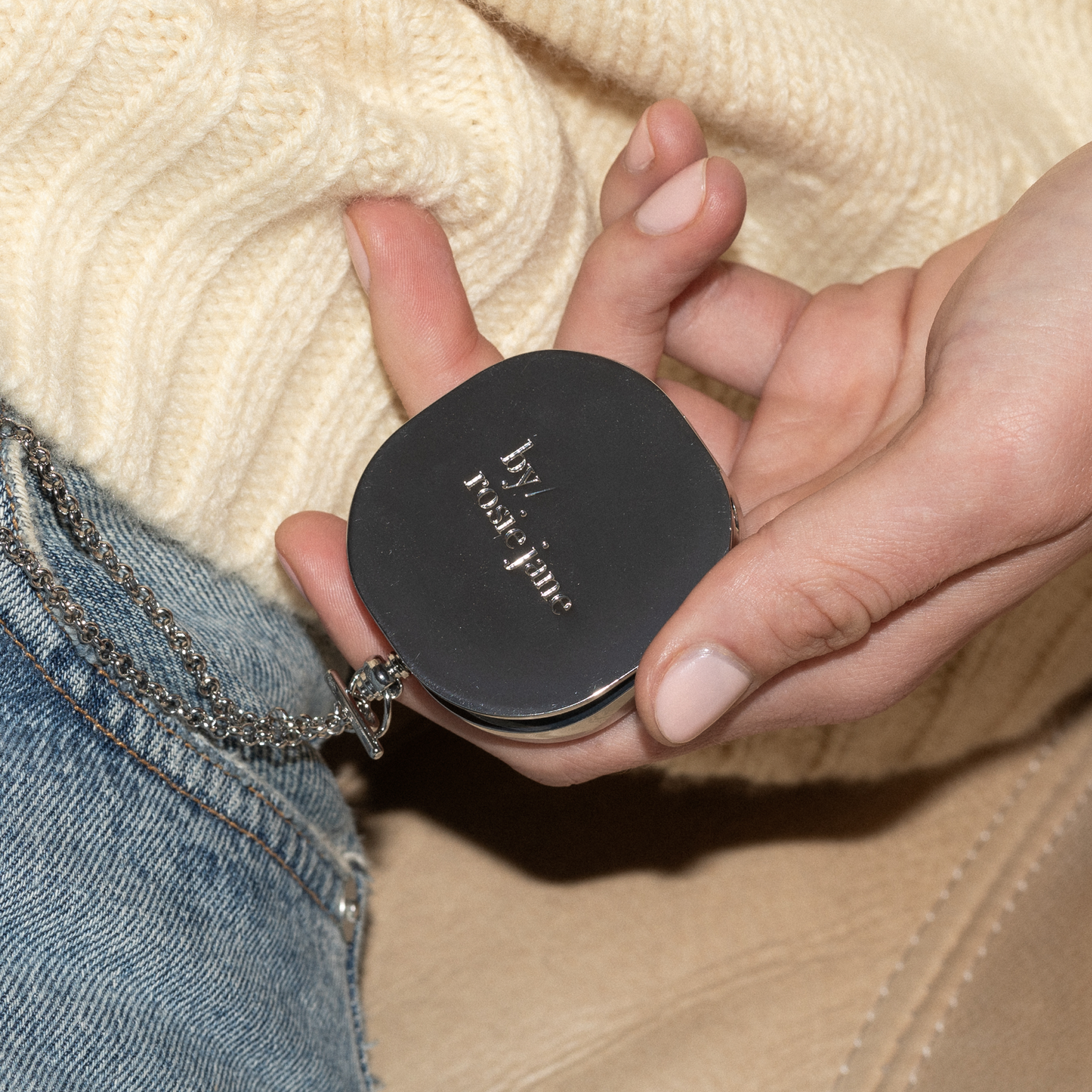 woman holding a by rosie jane solid perfume