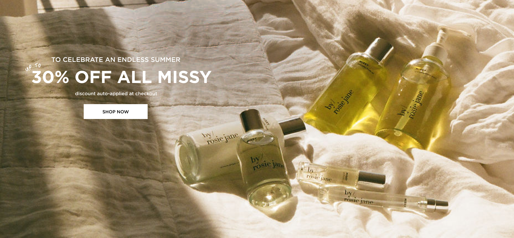 collection of missy products on a bed