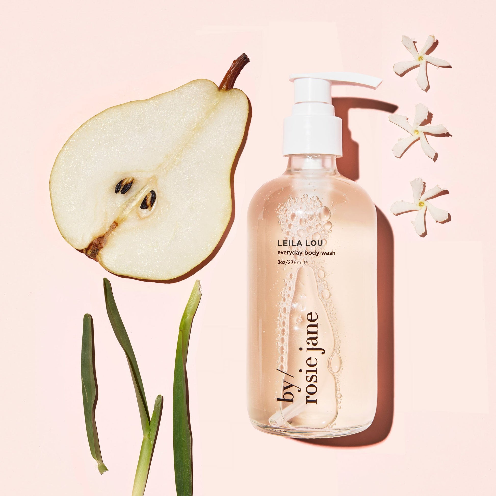 leila lou body wash with notes: pear, jasmine, and fresh cut grass.